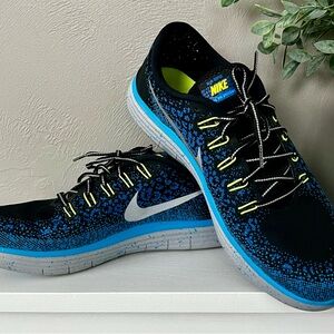 Men’s  size 13 Nike -blue black and neon green accents .